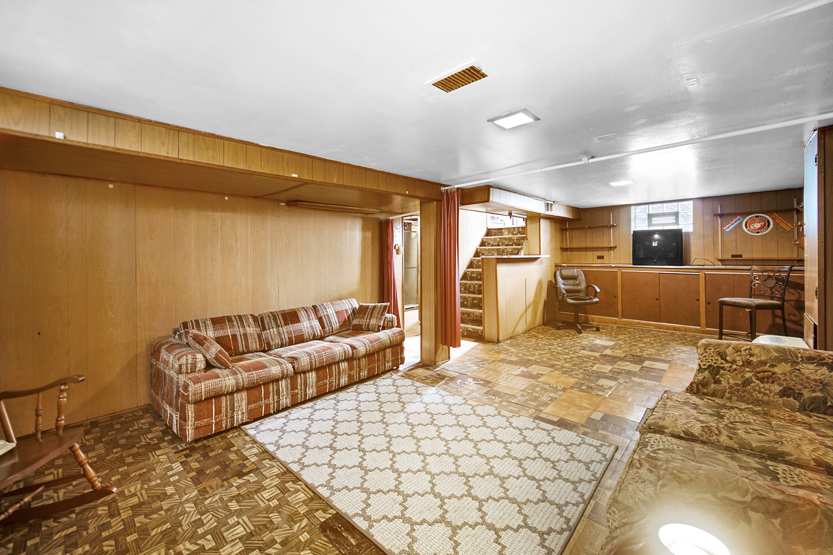 1453 Shell Street Hammond, IN 46320 - Photo 16 of 23 a spacious bedroom with a bed and a couch