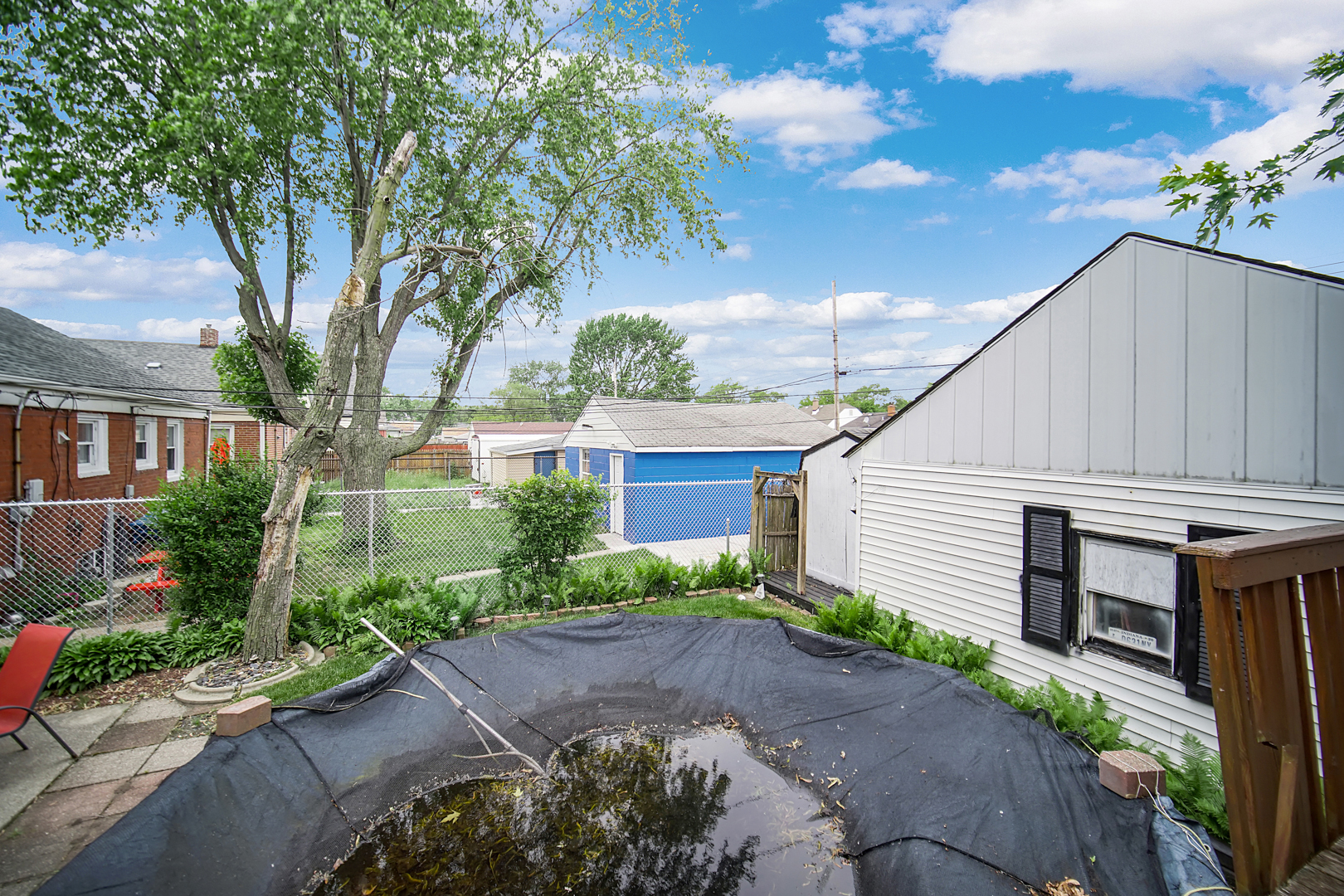 1453 Shell Street Hammond, IN 46320 - Photo 20 of 23 a view of a house with a garden