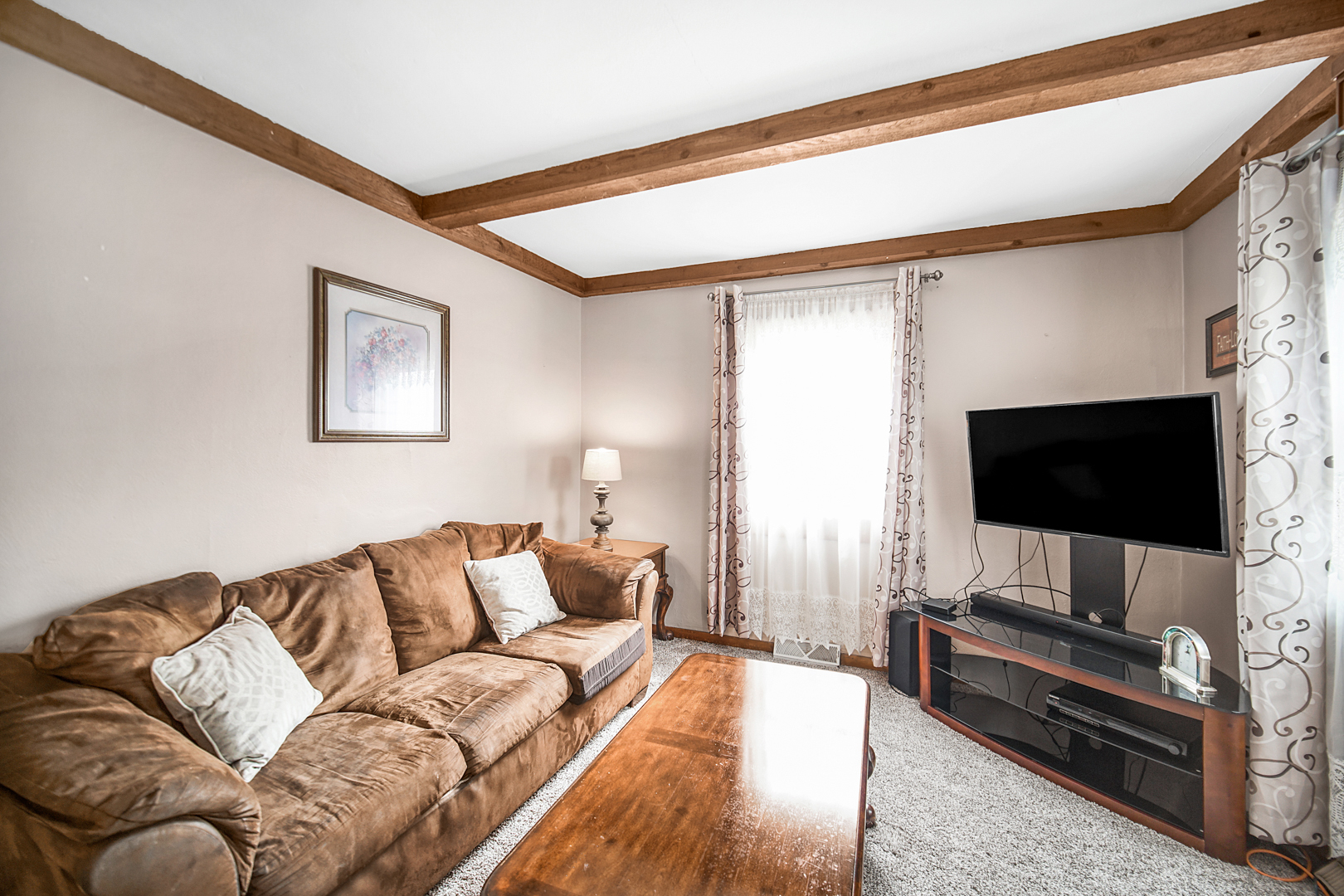 1453 Shell Street Hammond, IN 46320 - Photo 2 of 23 a living room with furniture and a flat screen tv