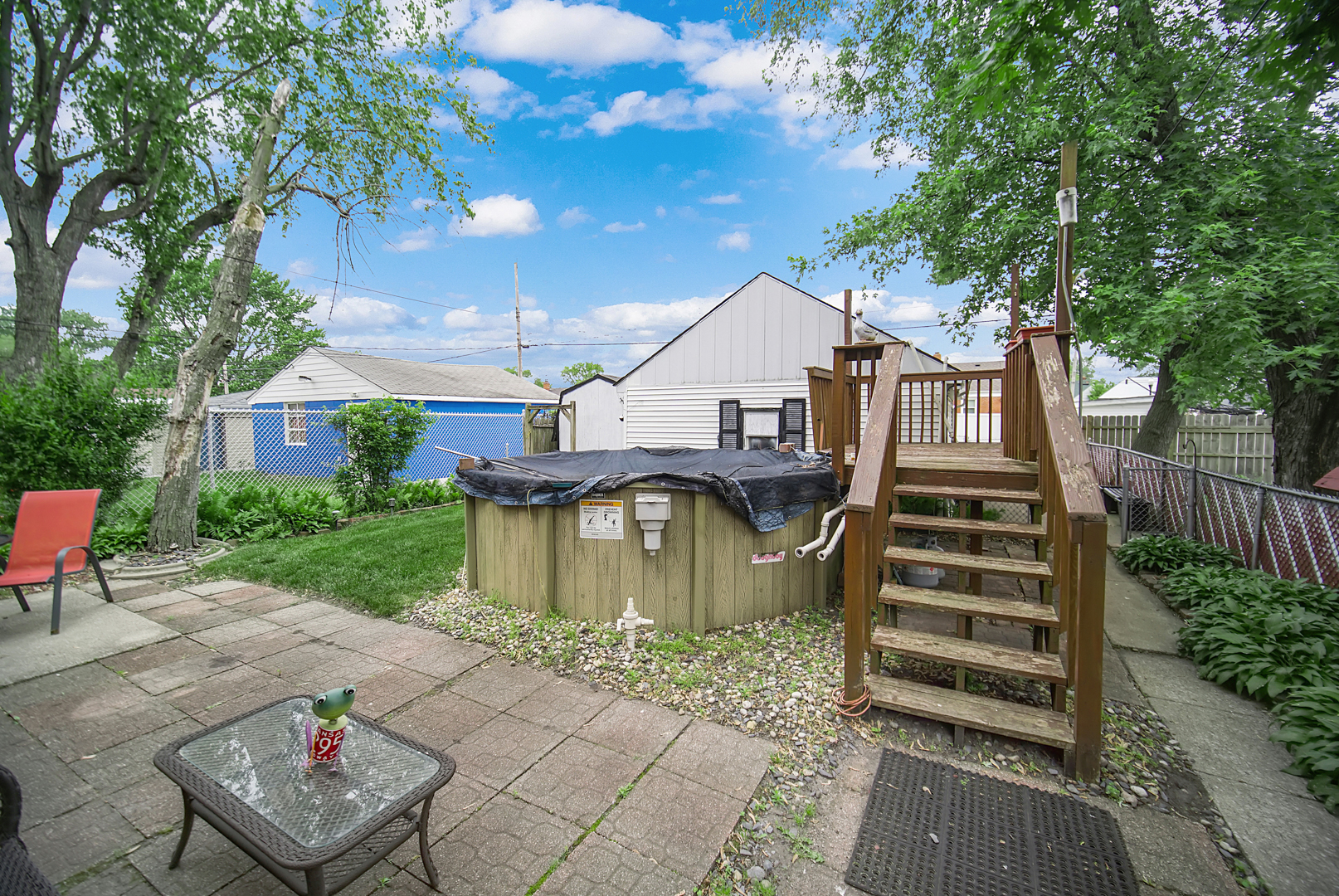 1453 Shell Street Hammond, IN 46320 - Photo 21 of 23 a front view of a house with a garden