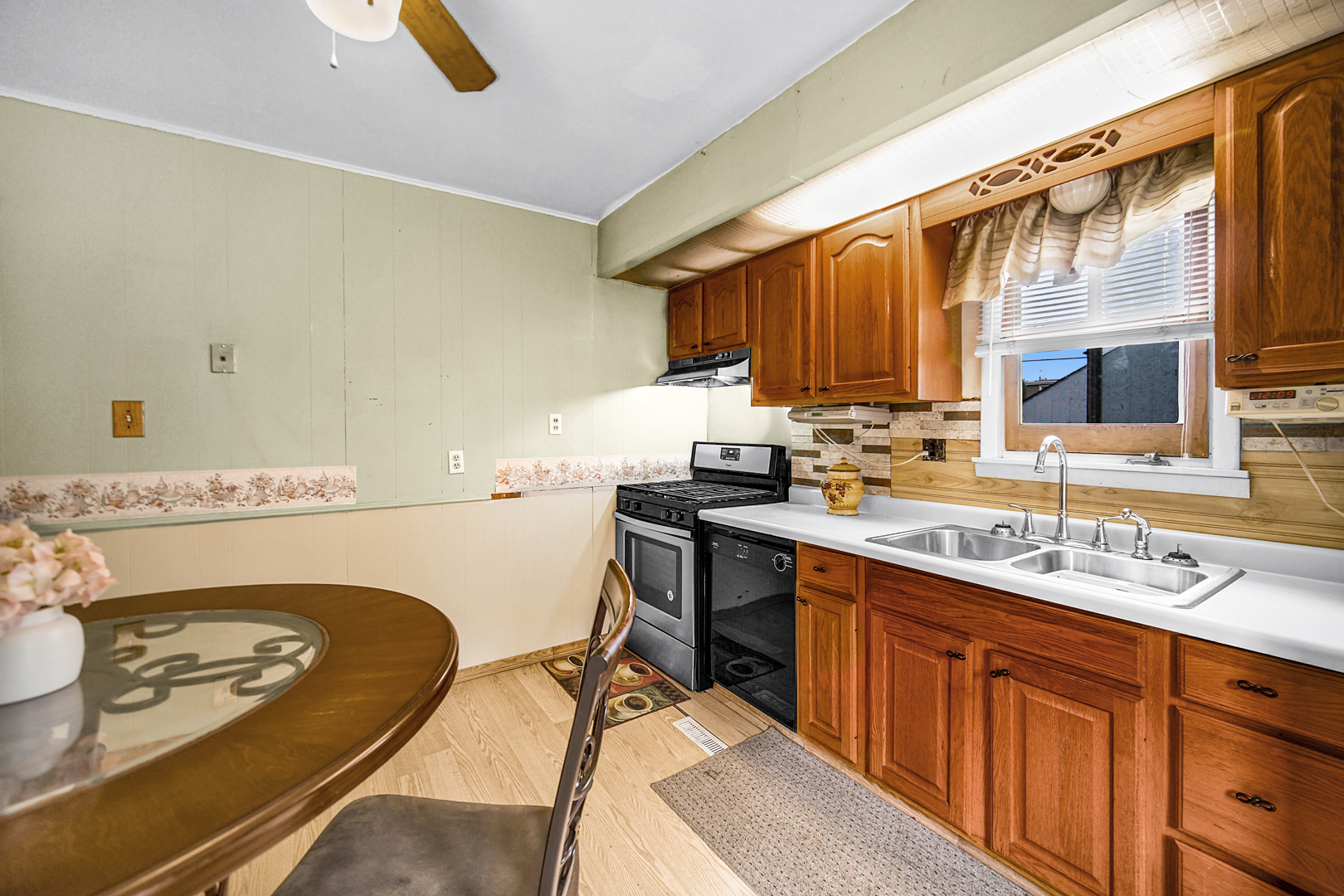 1453 Shell Street Hammond, IN 46320 - Photo 9 of 23 a bathroom with a sink double vanity and a mirror