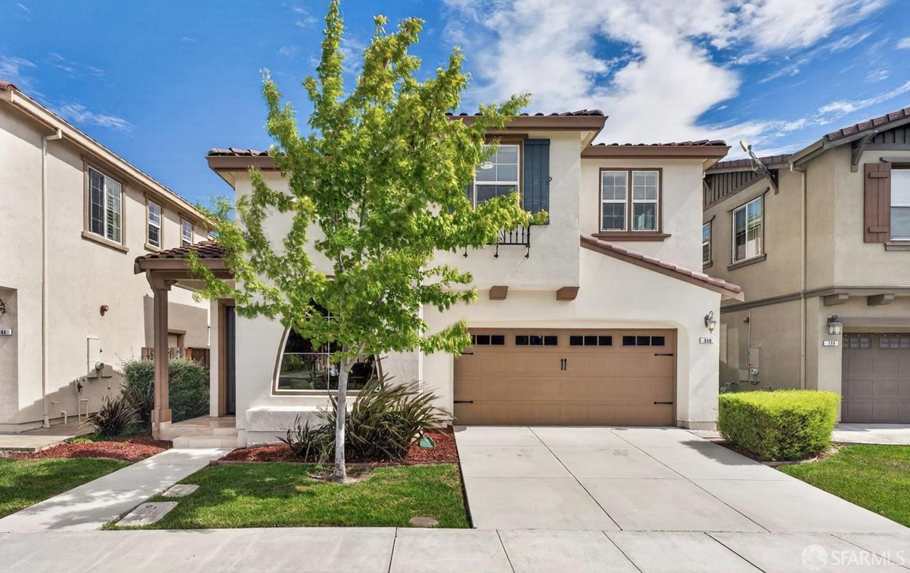 360 Gerald Circle Milpitas, CA 95035 - Photo 1 of 46 a front view of a house with a garden and plants