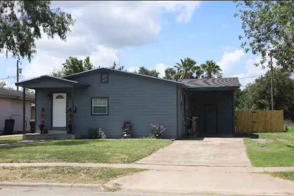 a house view with a garden space