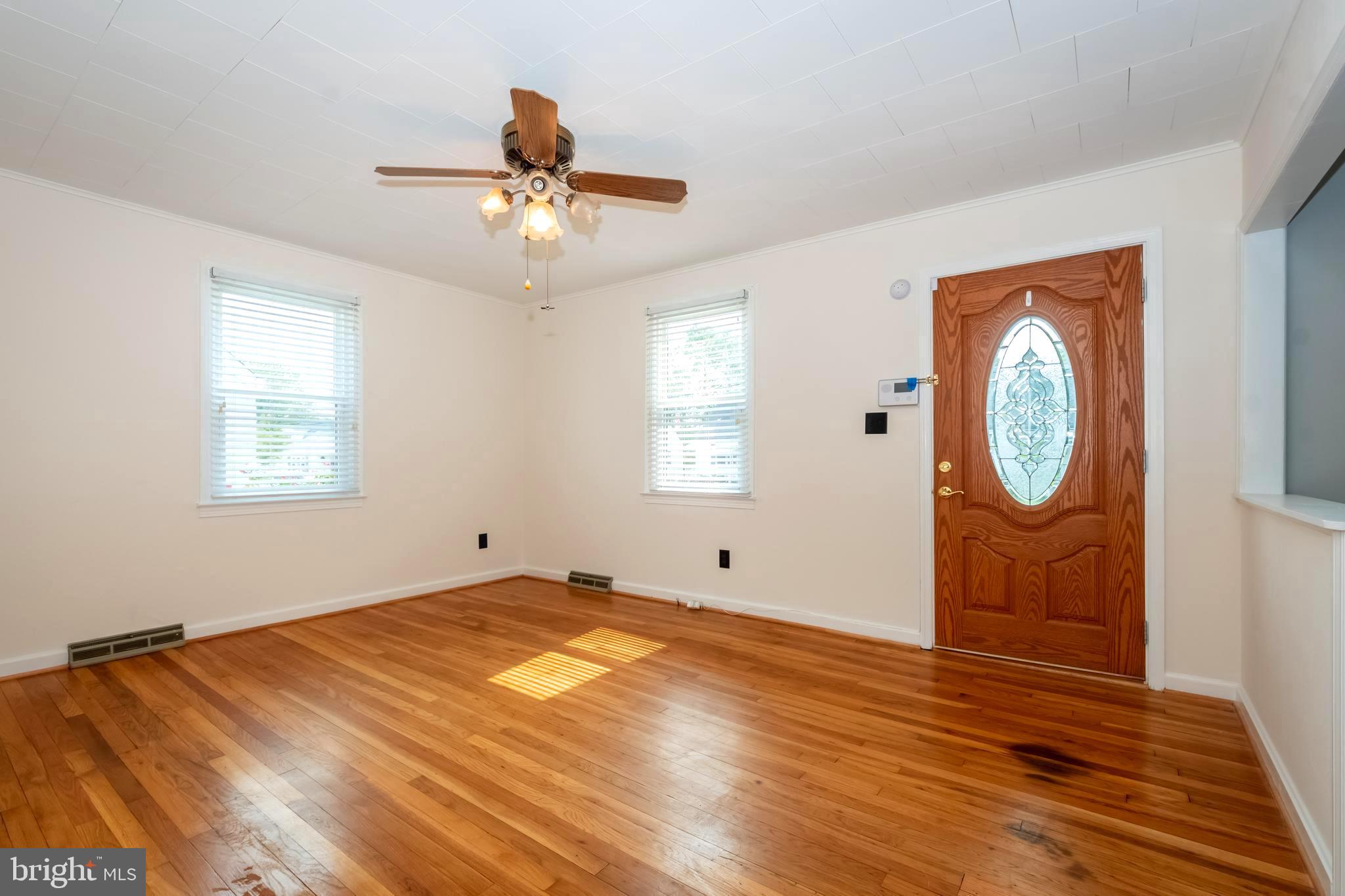 1720 Drexel Road Baltimore, MD 21222 - Photo 6 of 28 View of living room from the hallway