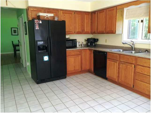 23 Hunts Meadow Road Whitefield, ME 04353 - Photo 3 of 17 Kitchen. Come in from the deck to a...