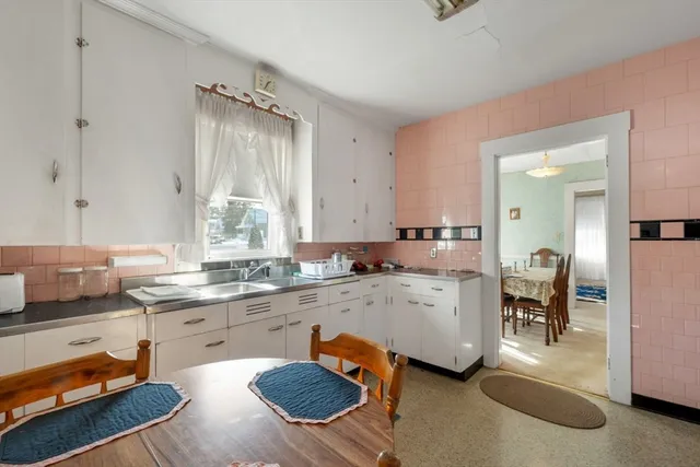 a workspace with furniture and wooden floor