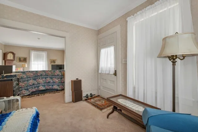 a room with furniture and a window