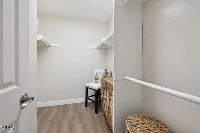 a view of a room with rack on the wall