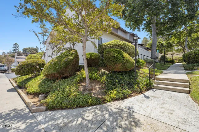 a backyard of a house with lots of green space