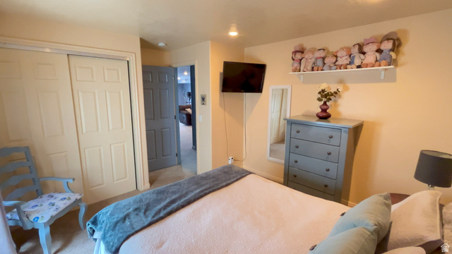 1797 Sunset Road Enoch, UT 84721 - Photo 40 of 80 Bedroom featuring neutral-toned walls, recessed lighting, and a carpeted floor