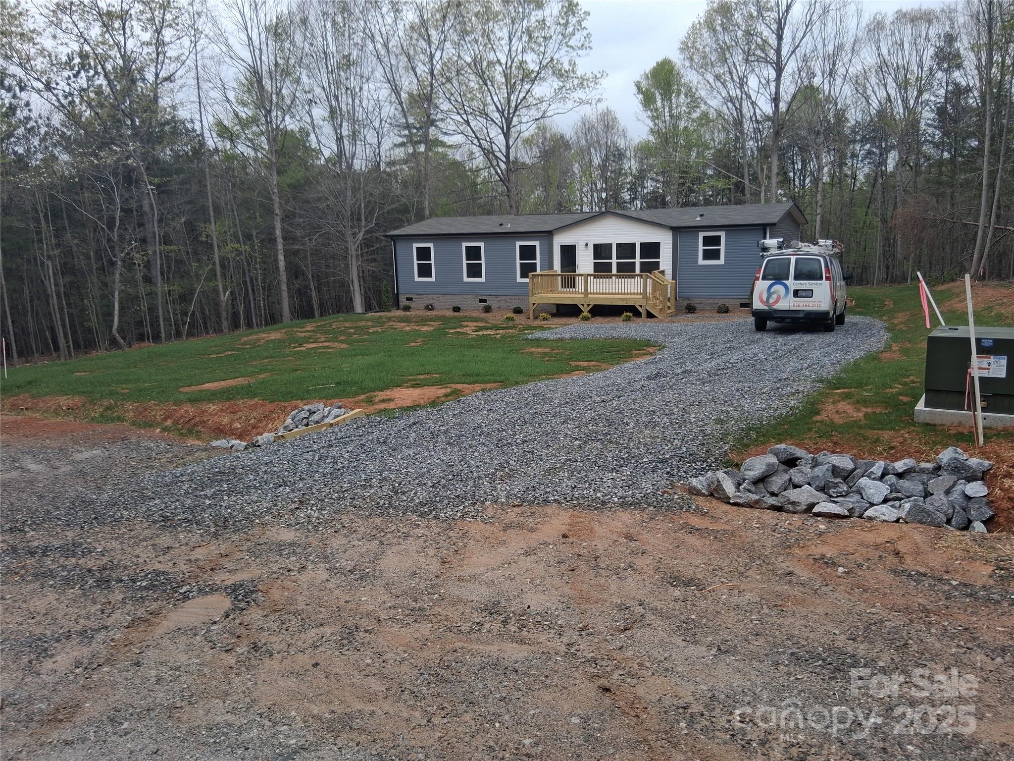 2299 Magnolia Place, Unit 14 Morganton, NC 28655 - Photo 20 of 34 a view of a house with backyard and trees