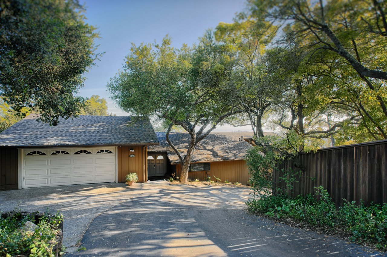 1500 Franceschi Road Santa Barbara, CA 93103 - Photo 17 of 18 a front view of a house with a yard and trees