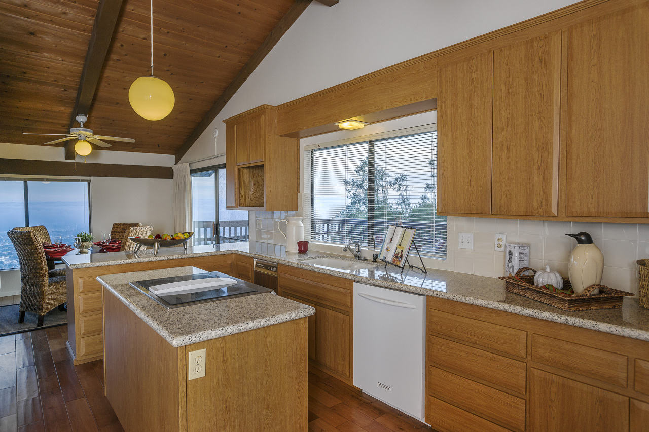 1500 Franceschi Road Santa Barbara, CA 93103 - Photo 3 of 18 a kitchen that has a sink and a stove