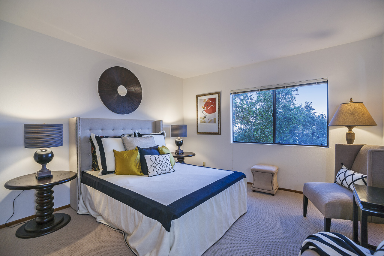 1500 Franceschi Road Santa Barbara, CA 93103 - Photo 9 of 18 a bedroom with a bed and a chandelier