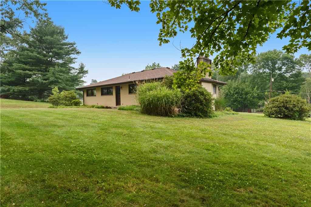 109 Beacon Road Renfrew, PA 16053 - Photo 32 of 33 a view of a house with a yard