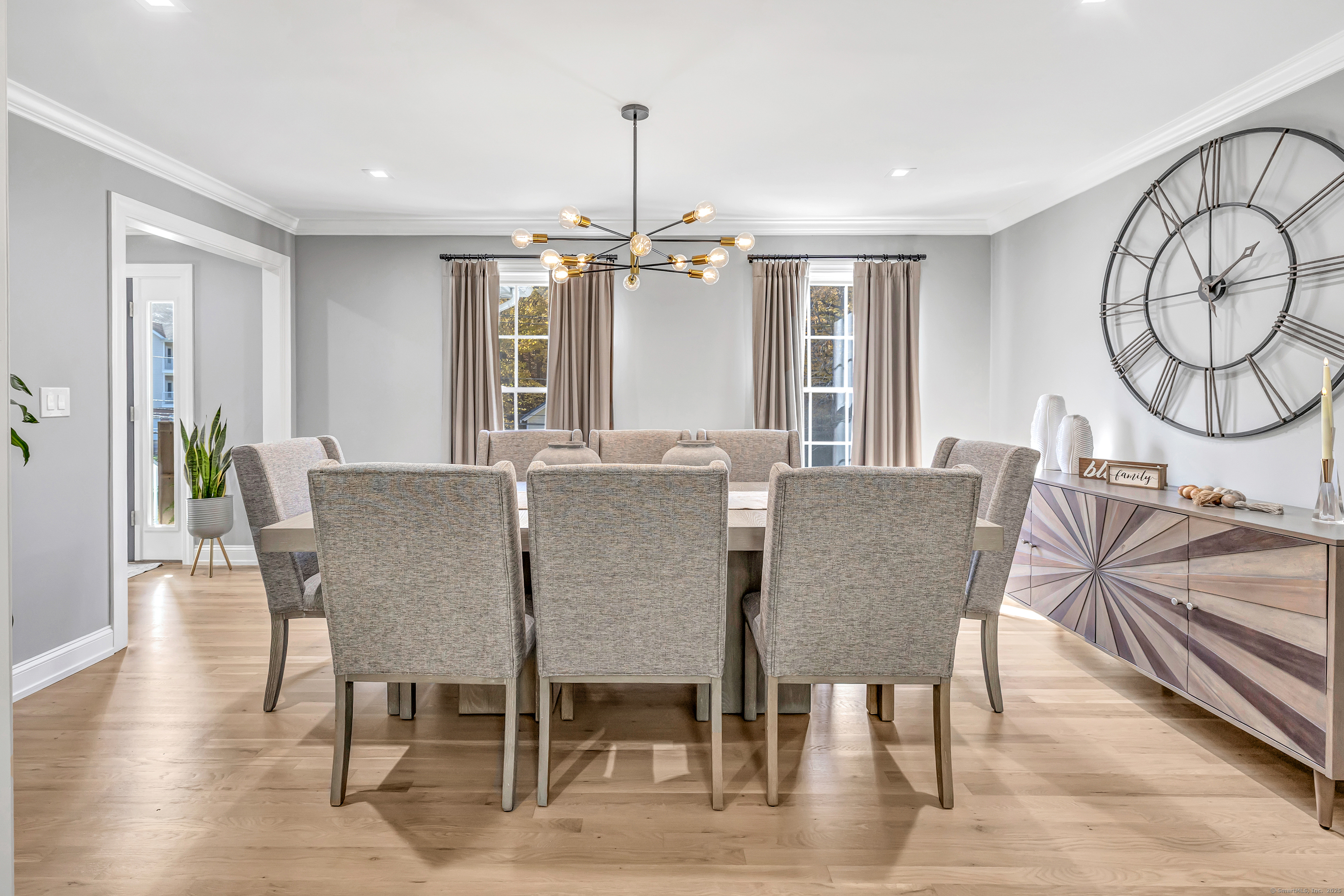 6680 Main Street Trumbull, CT 06611 - Photo 12 of 40 a view of a a dining room with furniture window and wooden floor