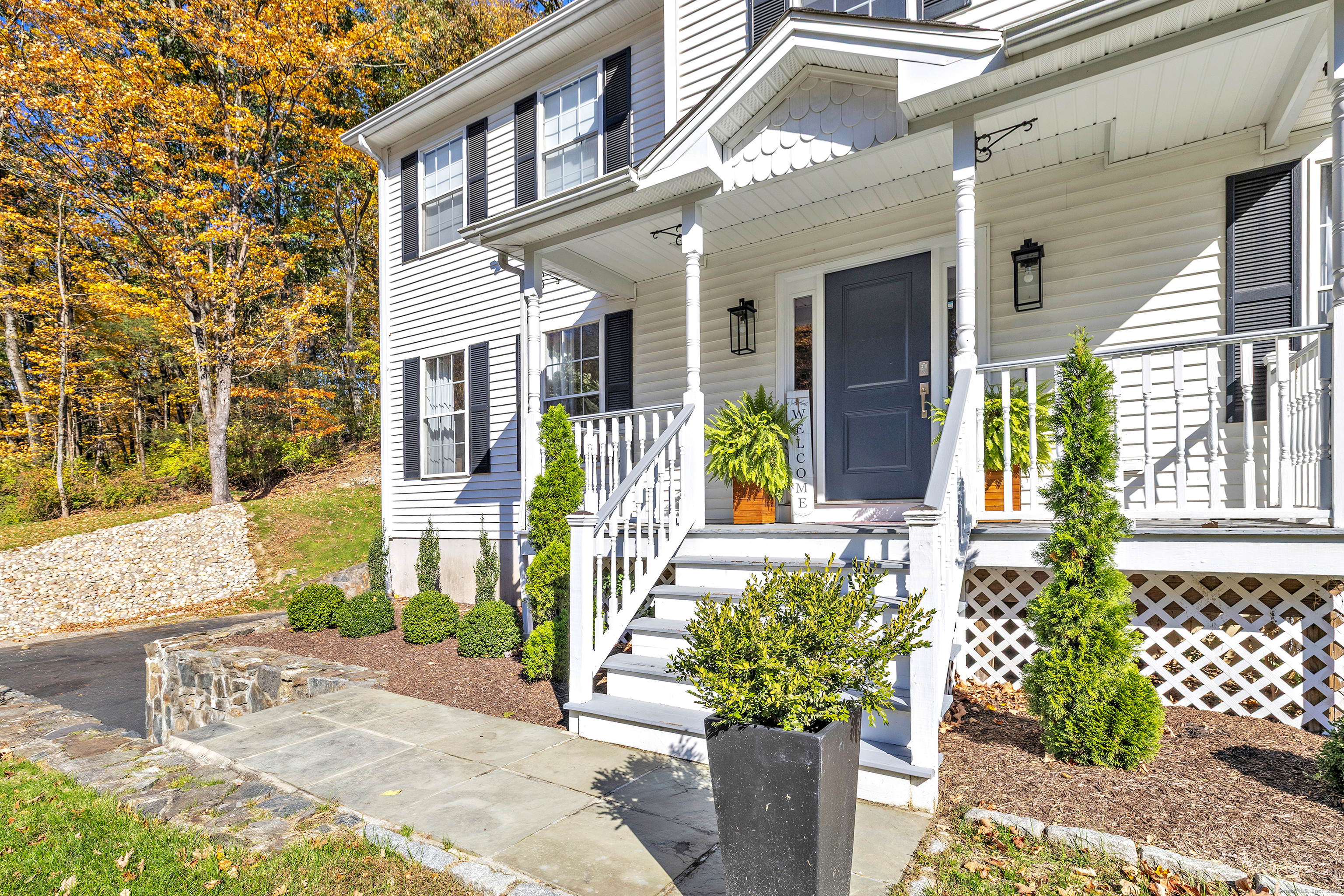 6680 Main Street Trumbull, CT 06611 - Photo 2 of 40 a view of a building with potted plants