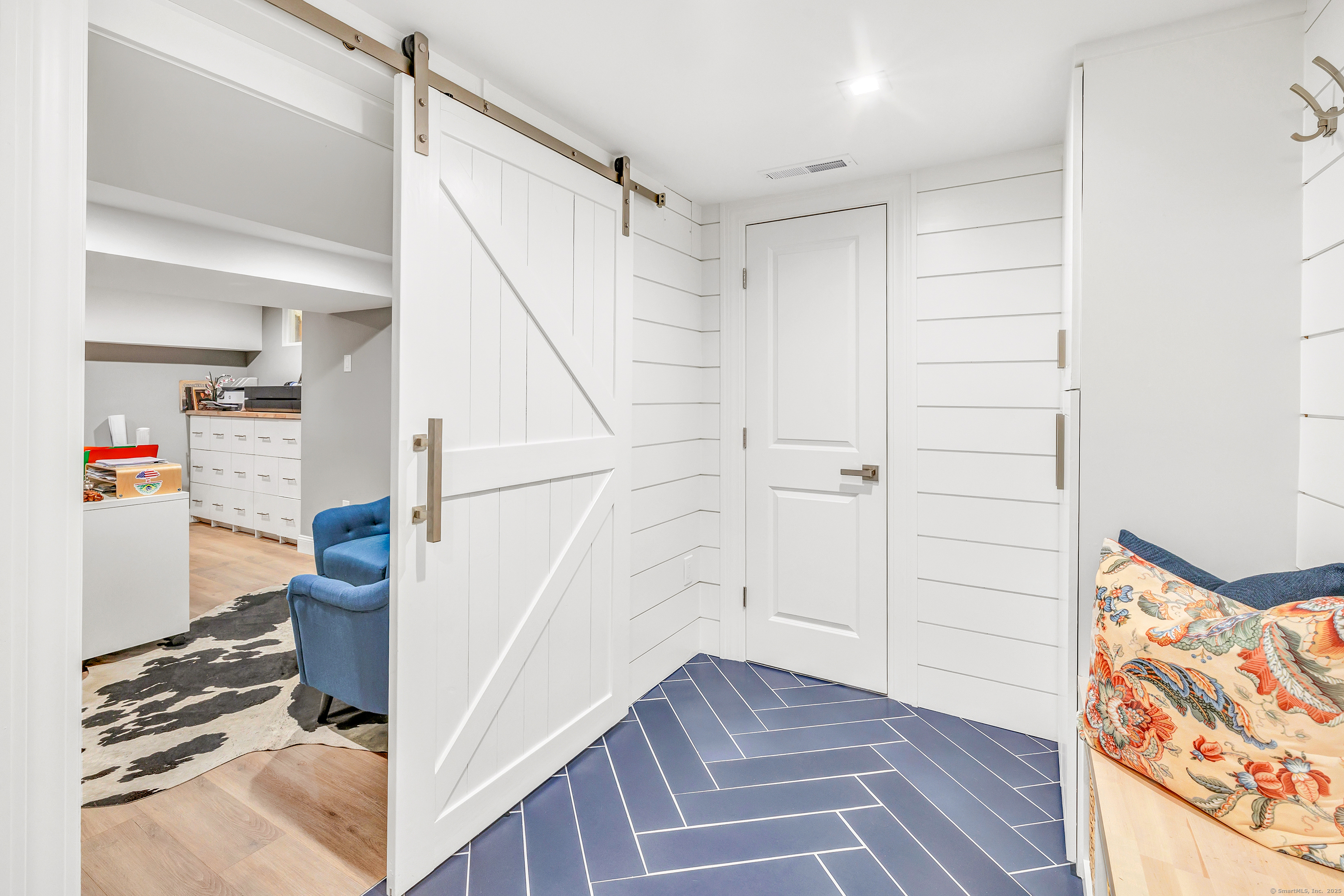 6680 Main Street Trumbull, CT 06611 - Photo 33 of 40 a view of hallway with stairs and wooden floor