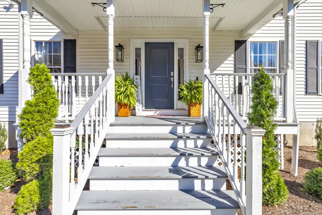 a view of an entrance front of house