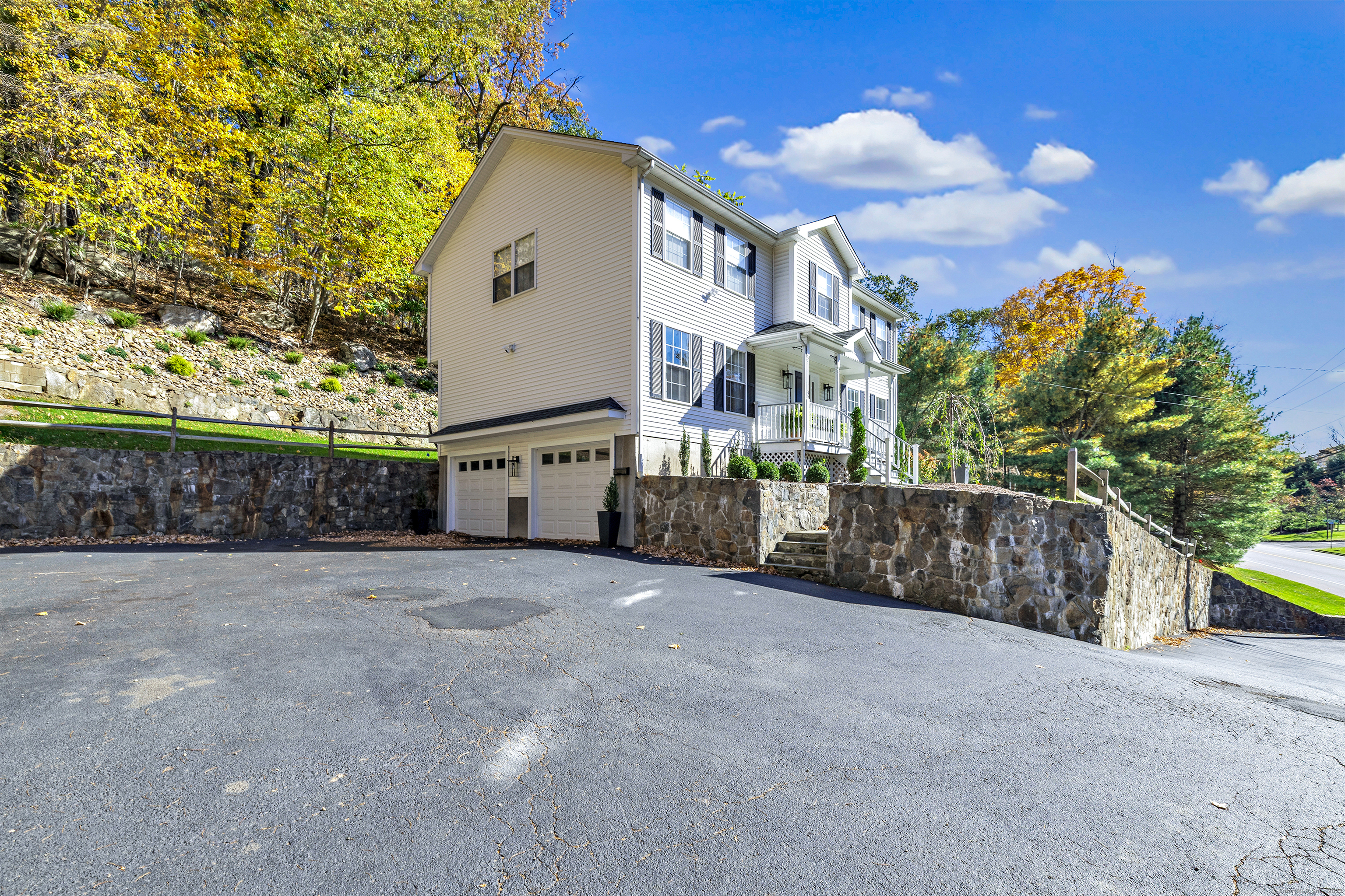 6680 Main Street Trumbull, CT 06611 - Photo 40 of 40 a view of a house with a backyard