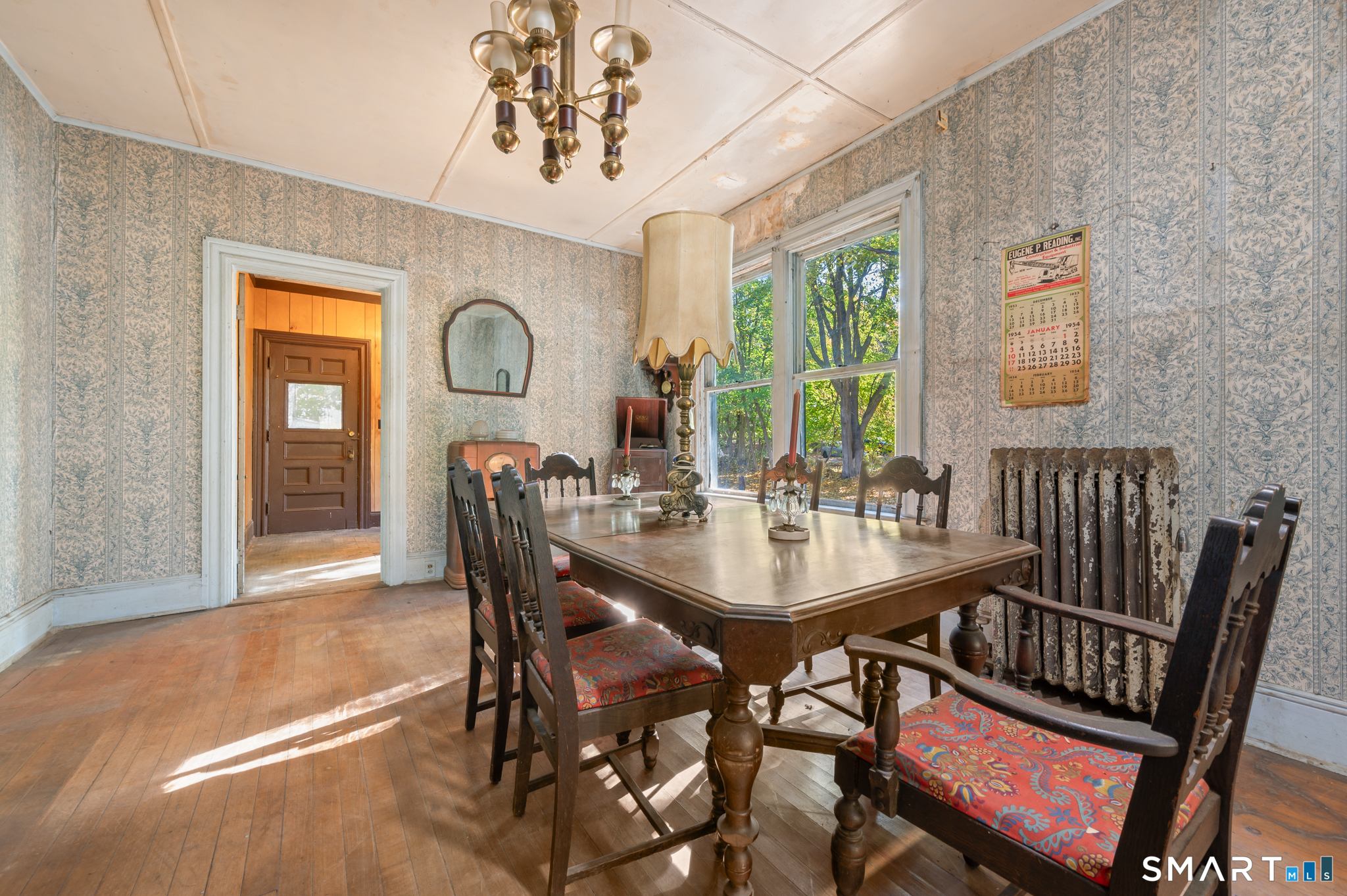 124 River Road Willington, CT 06279 - Photo 16 of 40 a view of a dining room with furniture window and outside view