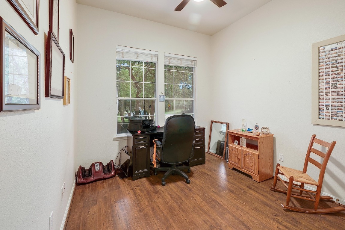 210 Buoy Circle Georgetown, TX 78633 - Photo 22 of 32 a view of a workspace with furniture and a window