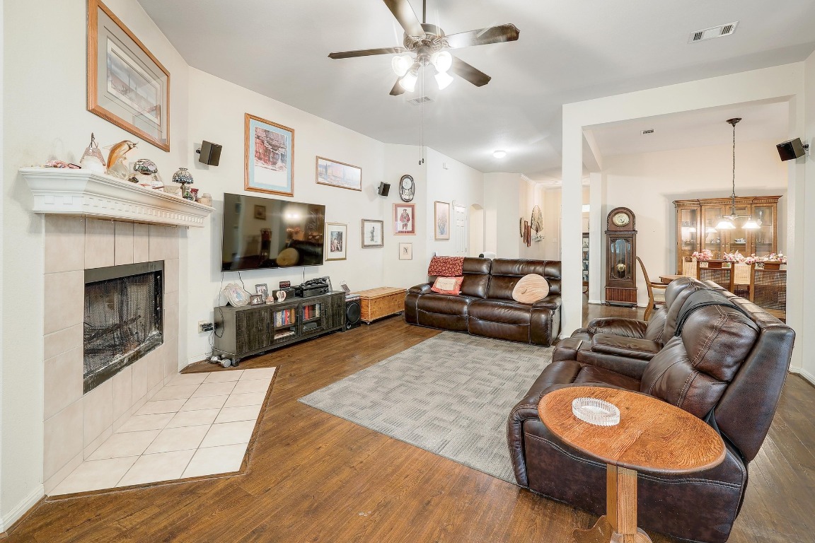 210 Buoy Circle Georgetown, TX 78633 - Photo 4 of 32 a living room with furniture a flat screen tv and kitchen view