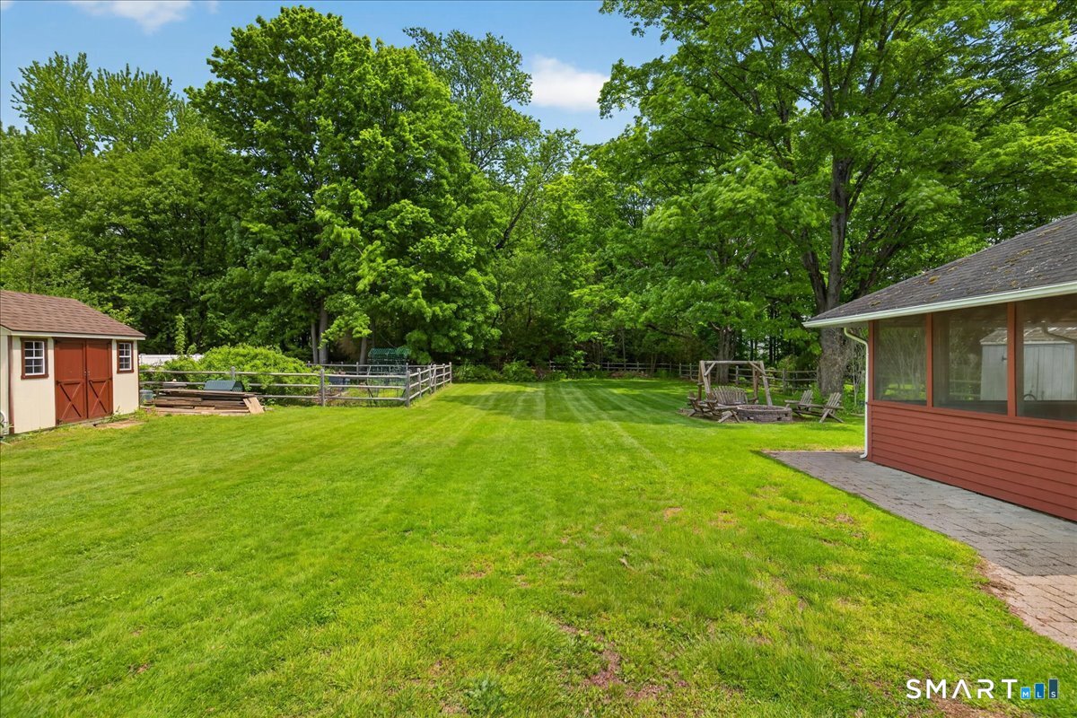 1006 King Road Cheshire, CT 06410 - Photo 31 of 40 The lovely back yard includes several outbuildings including two sheds (one newer with electricity), screened gazebo (with electricity) and a firepit area with seating.