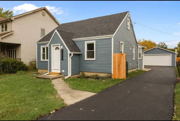 a view of a yard in front of a house