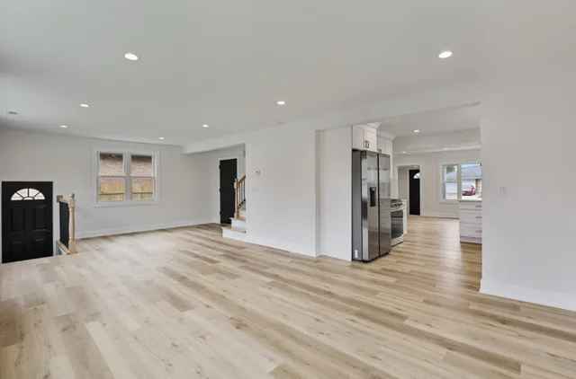 a view of a livingroom with wooden floor