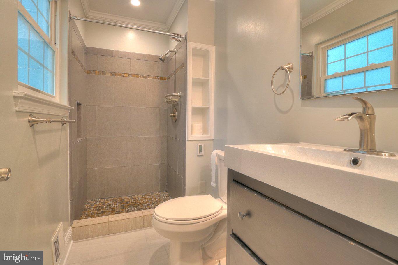 2405 Earlsgate Court Reston, VA 20191 - Photo 34 of 56 Modern bathroom with sleek finishes.