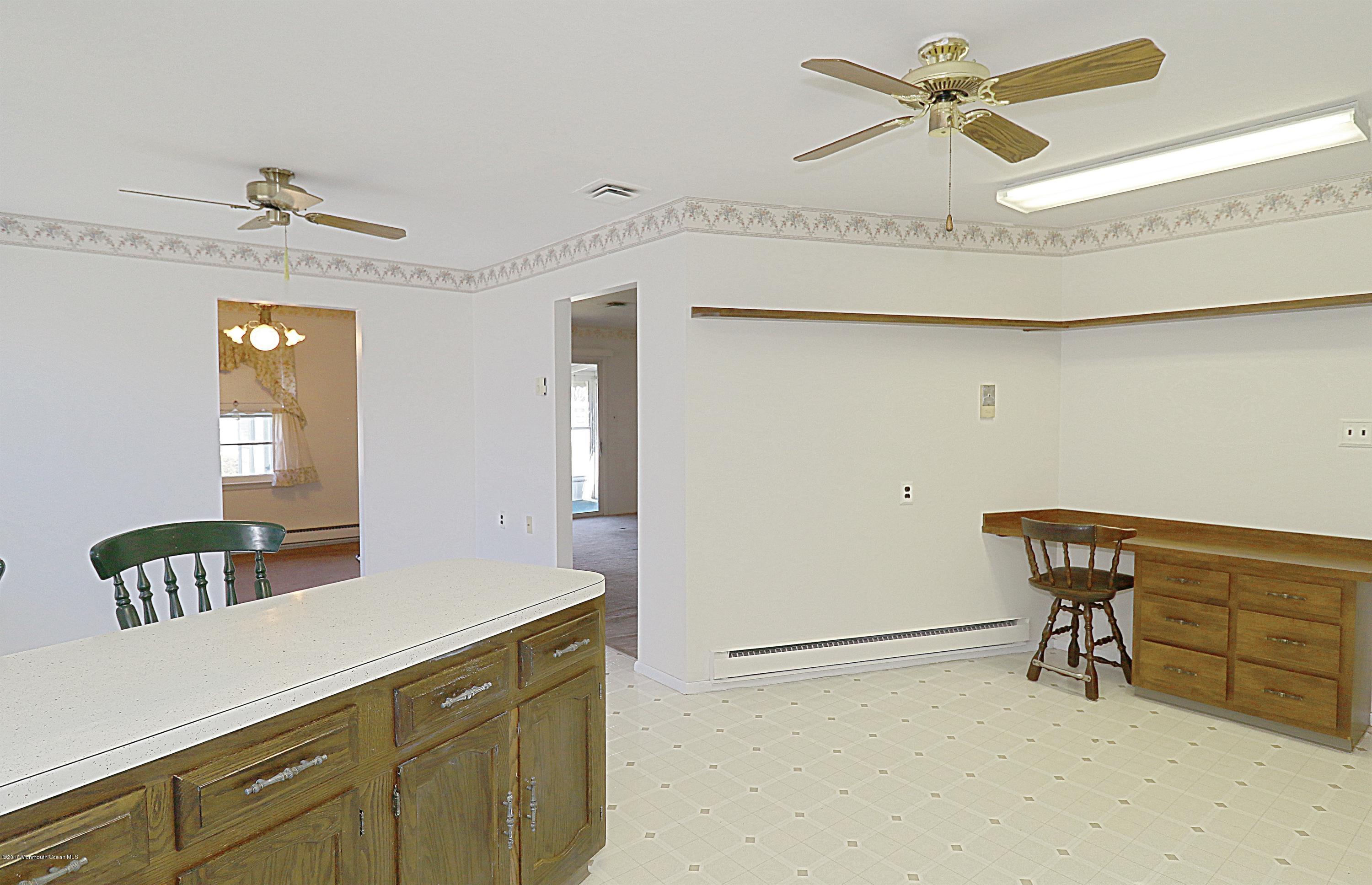 4 Markham Road Brick, NJ 08724 - Photo 10 of 28 a view of room with furniture and a chandelier