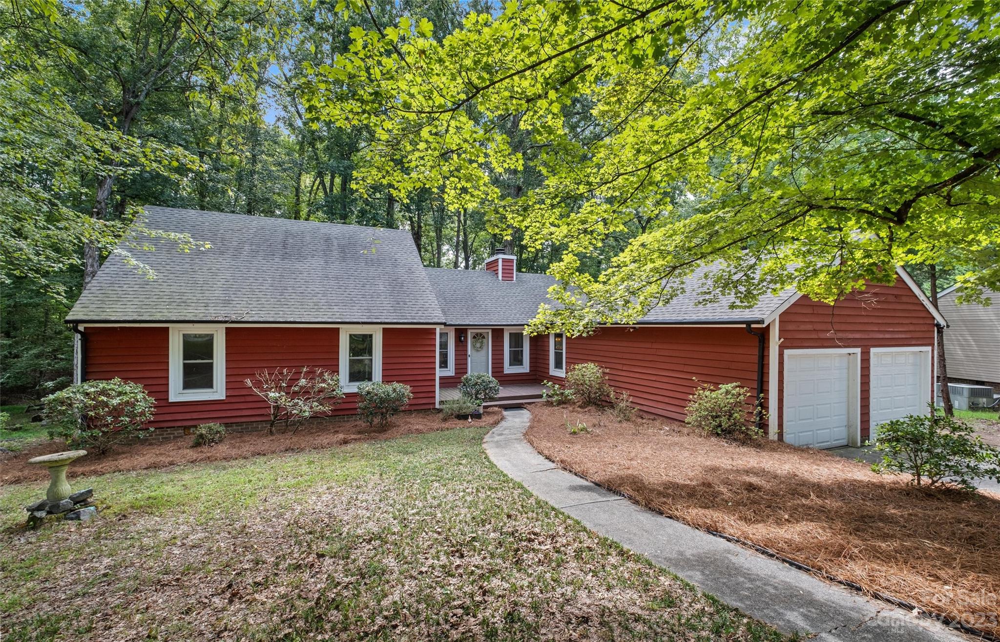 12114 Rock Canyon Drive Charlotte, NC 28226 - Photo 1 of 37 front view of a house with a yard