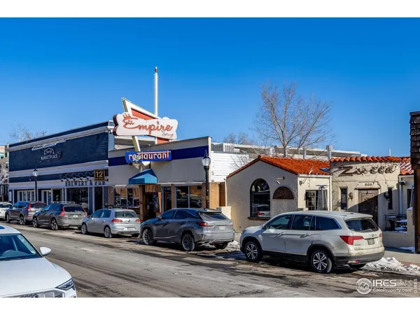 a car parked in front of a building