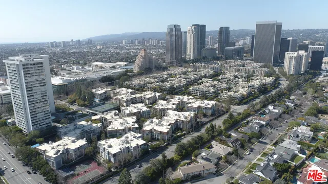 a view of a city with tall buildings