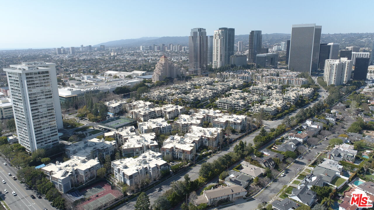 a view of a city with tall buildings