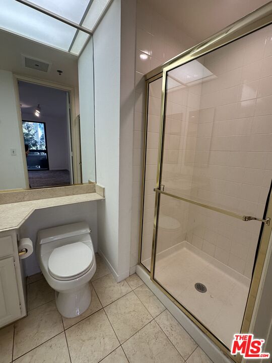 2122 Century Park Lane, Unit 312 Los Angeles, CA 90067 - Photo 32 of 44 a bathroom with a toilet and a shower
