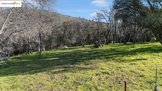 a view of a lake with mountains in the background