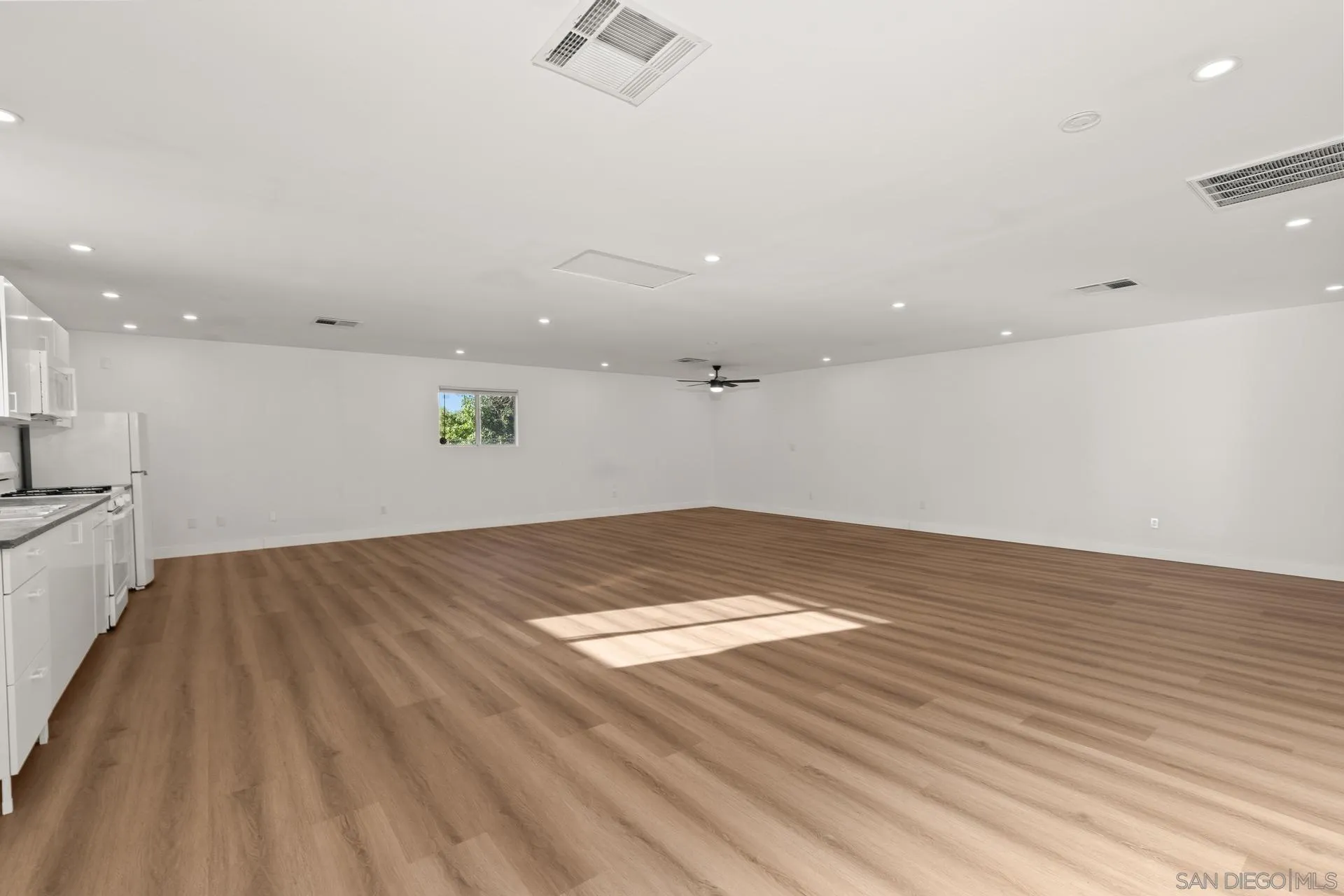 539 Steffy Road Ramona, CA 92065 - Photo 14 of 60 wooden floor in an empty room with a window