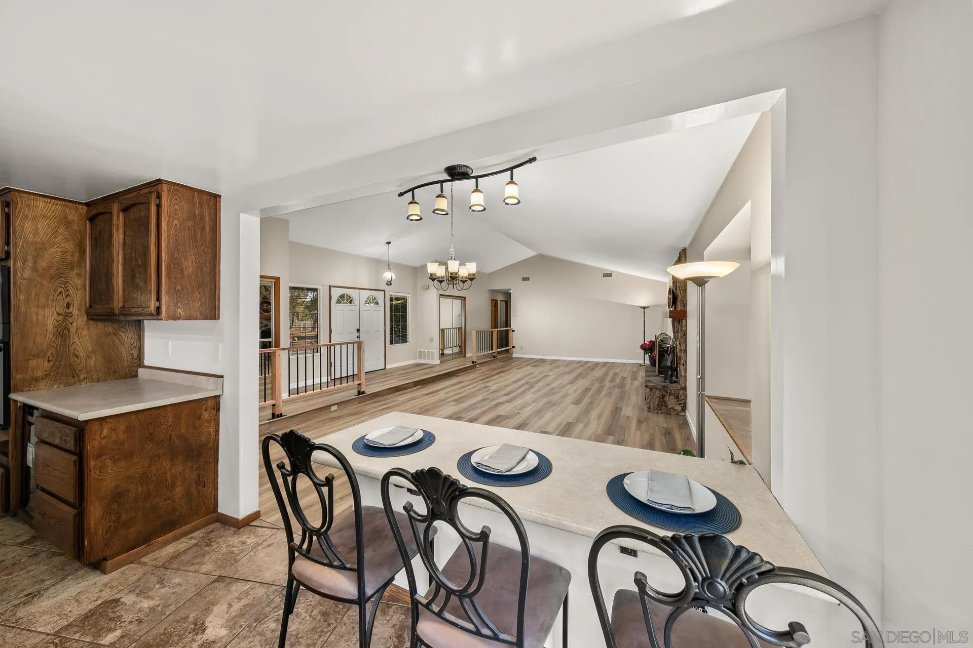 539 Steffy Road Ramona, CA 92065 - Photo 26 of 60 a view of a dining room with furniture and a chandelier