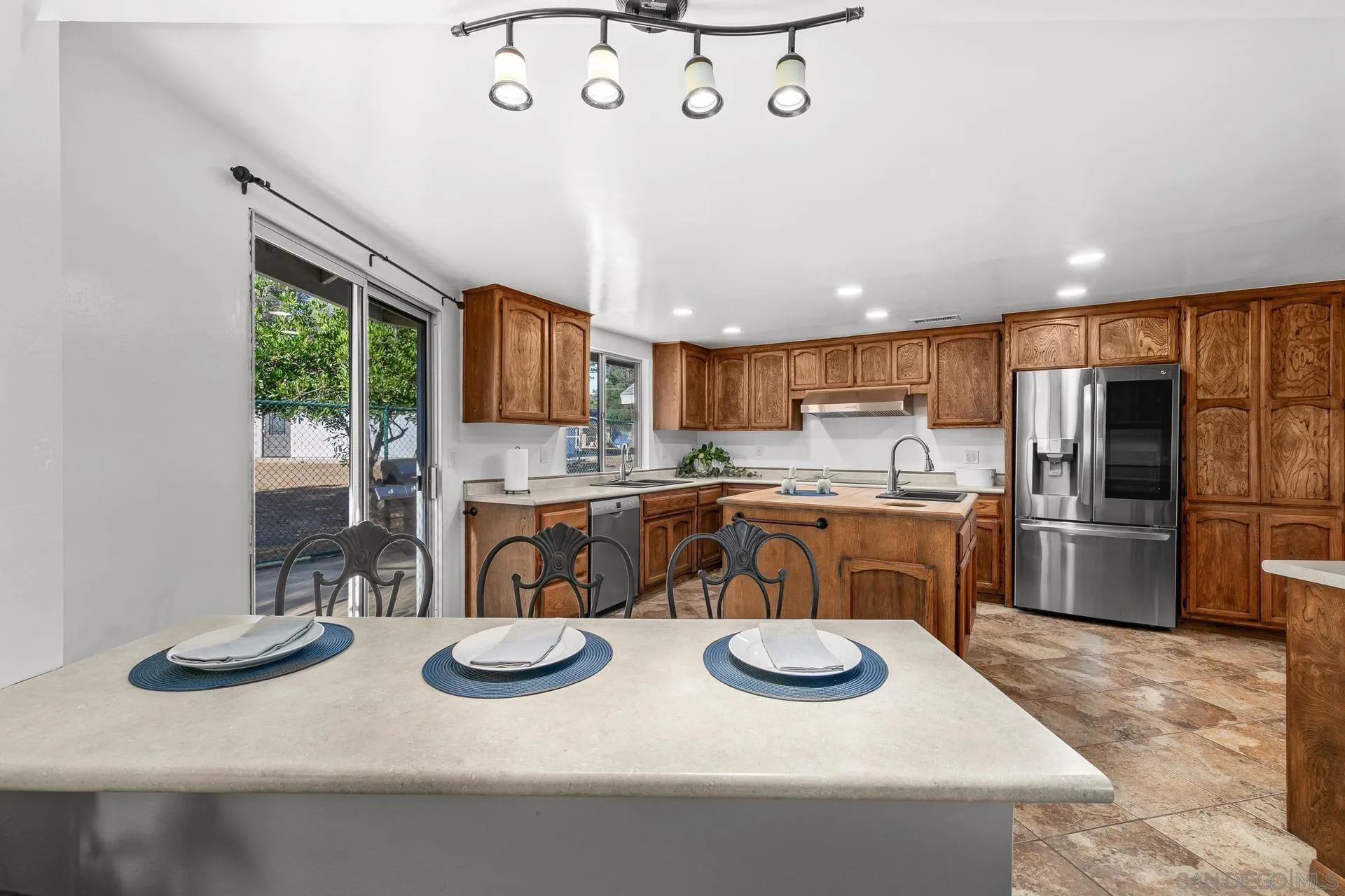 539 Steffy Road Ramona, CA 92065 - Photo 28 of 60 a kitchen with sink and refrigerator