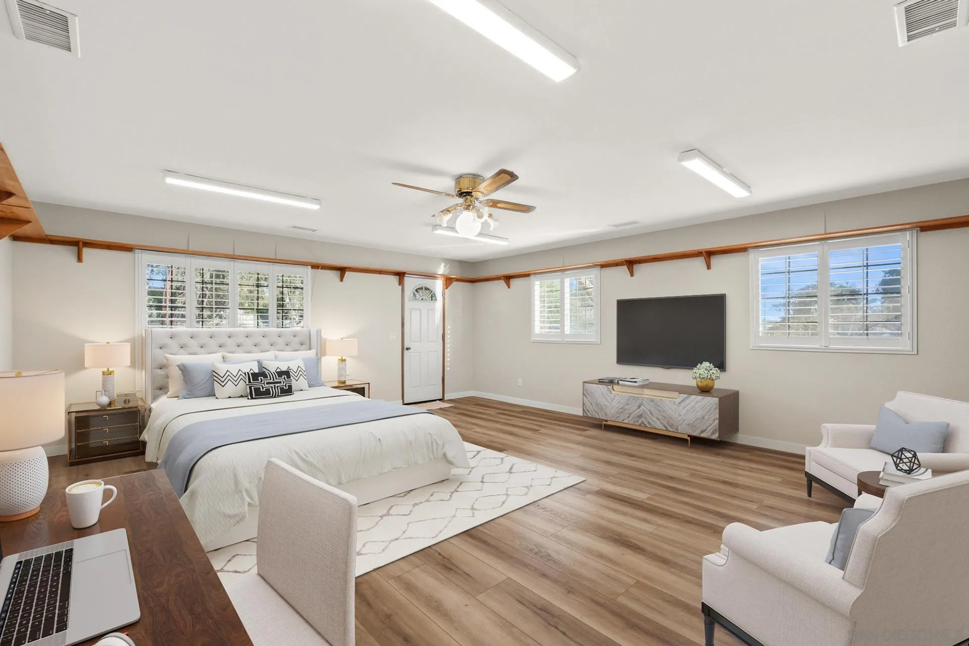 539 Steffy Road Ramona, CA 92065 - Photo 32 of 60 a bedroom with a bed and a flat screen tv