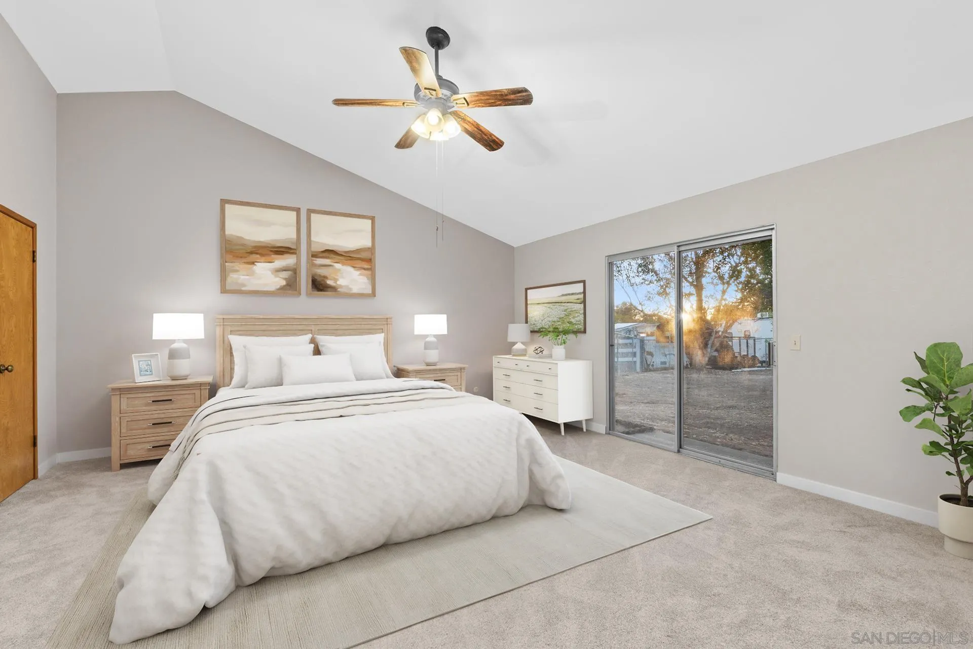 539 Steffy Road Ramona, CA 92065 - Photo 36 of 60 a bedroom with a large bed a chandelier and closet