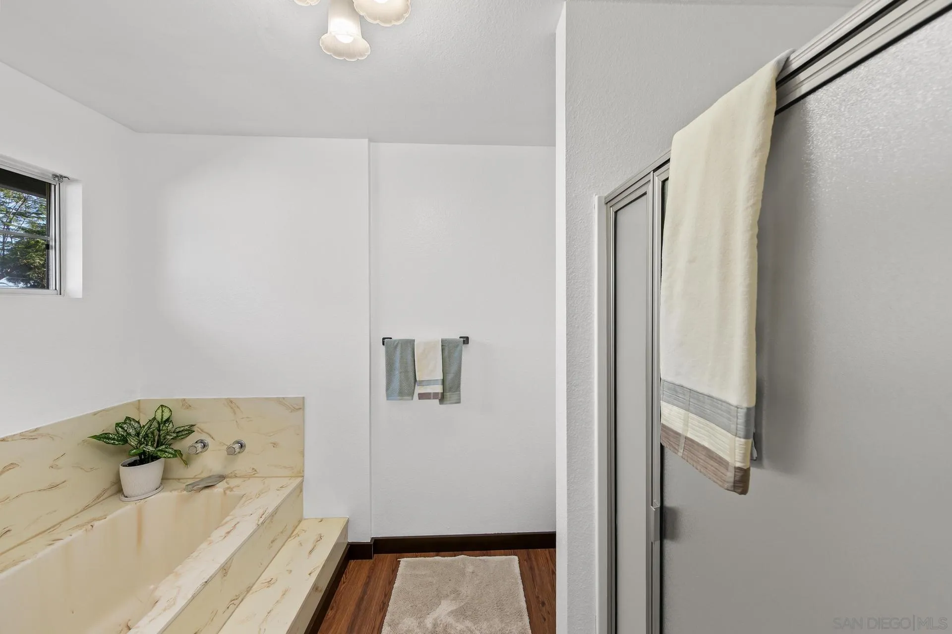 539 Steffy Road Ramona, CA 92065 - Photo 41 of 60 a bathroom with a bathtub and shower