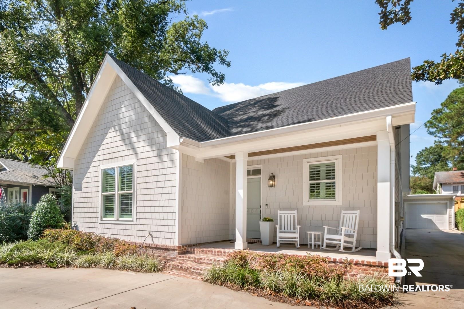 4404 Stein Street Mobile, AL 36608 - Photo 49 of 50 View of front of property featuring a porch and a shingled roof