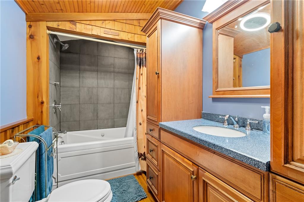 301 Kramer Way Pittsburgh, PA 15211 - Photo 23 of 32 a bathroom with a sink a toilet and shower