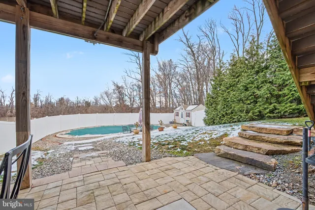 a view of a backyard of the house