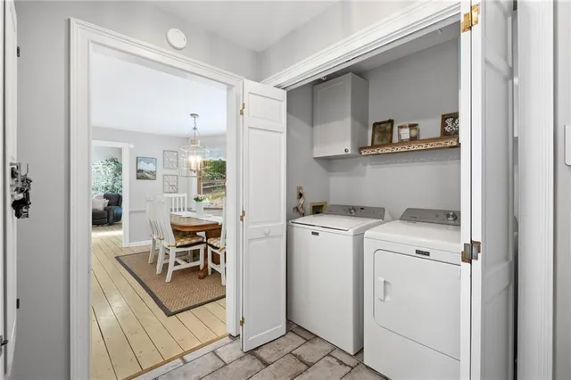 a view of kitchen with sink and furniture