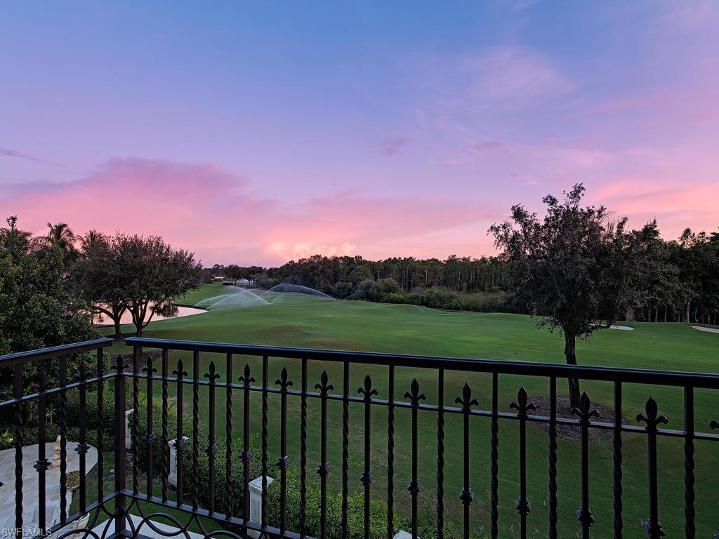 9766 Bent Grass Bend Naples, FL 34108 - Photo 21 of 35 a view of a balcony with a garden