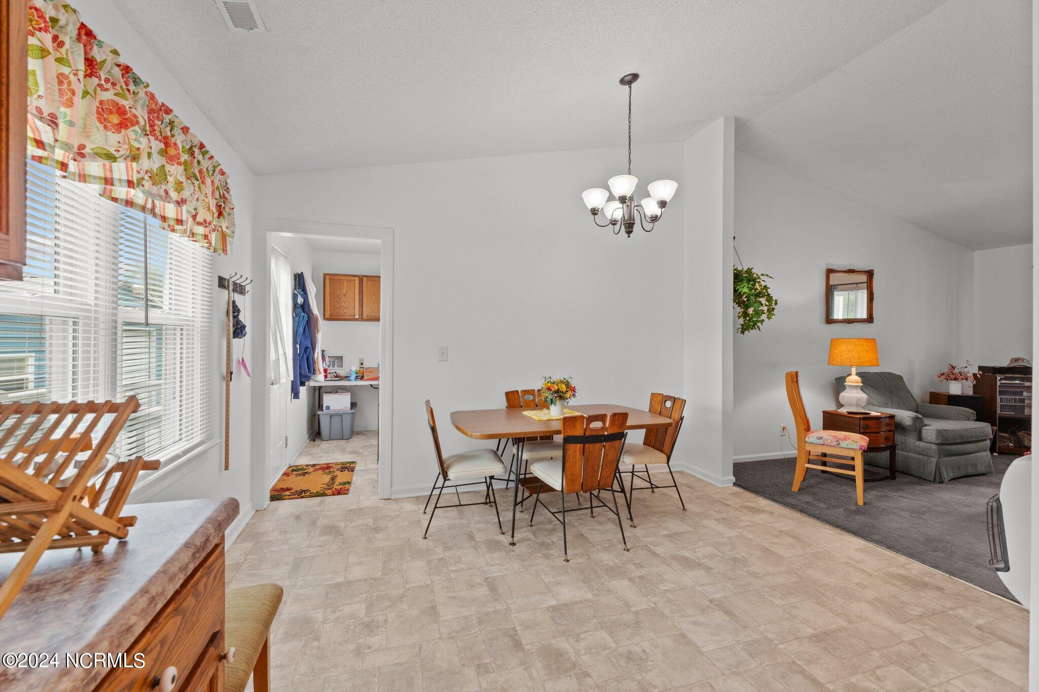 3398 Alvin Road Grimesland, NC 27837 - Photo 11 of 52 KITCHEN TOWARDS DINING ROOM